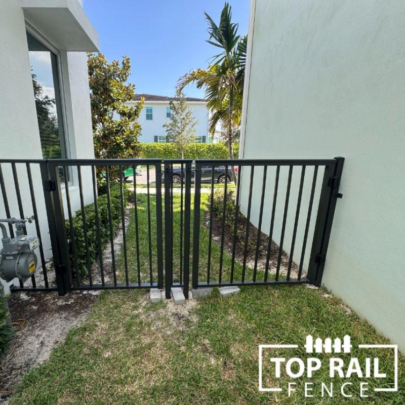 aluminum fence installed by top rail fence