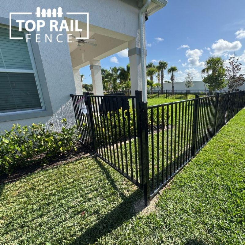 aluminum fence installed by top rail fence