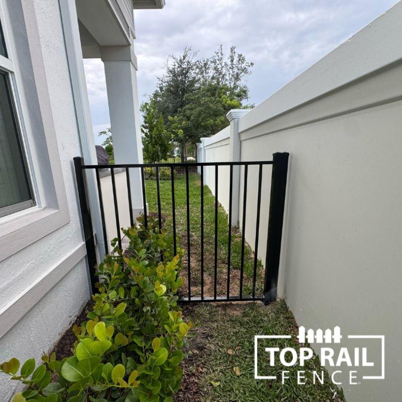 aluminum fence installed by top rail fence