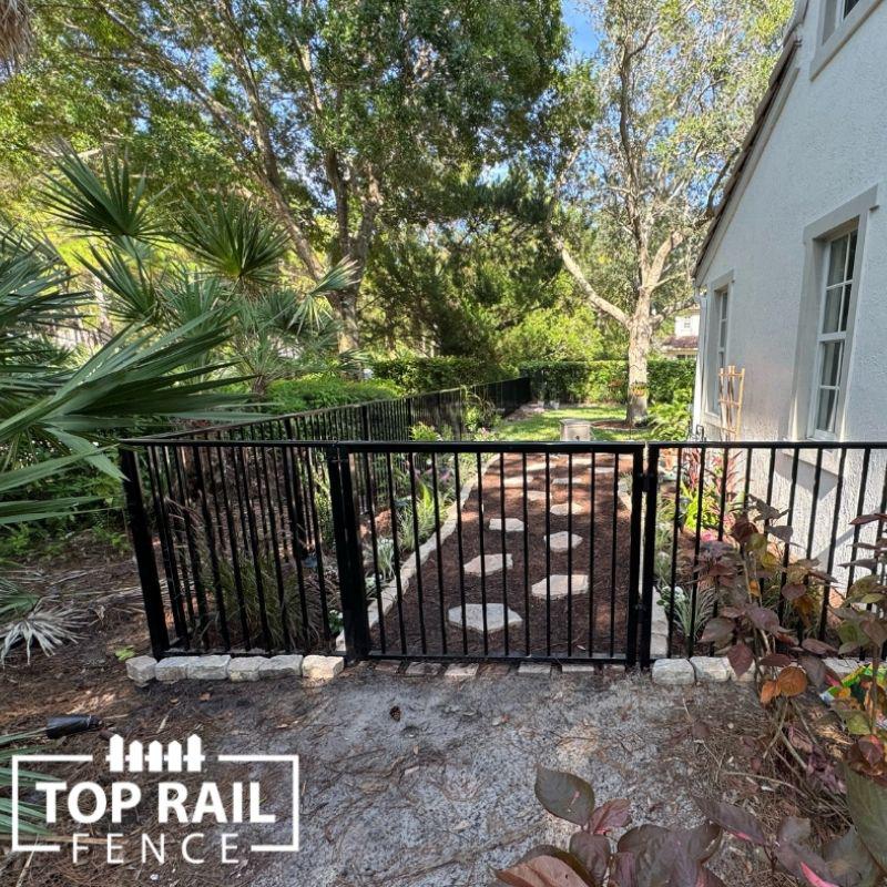 aluminum fence installed by top rail fence