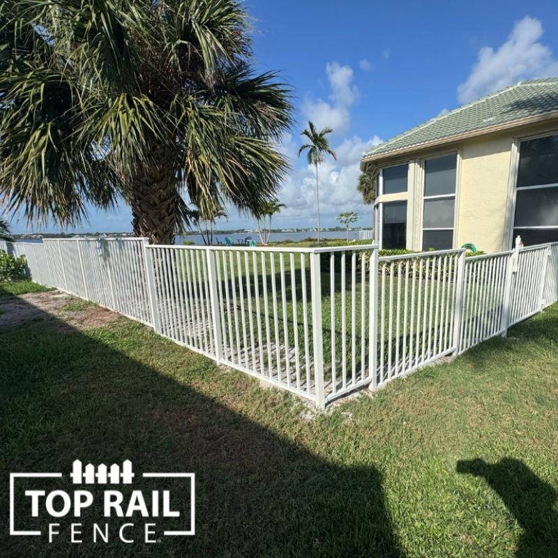 white aluminum fence installed by Top Rail Fence