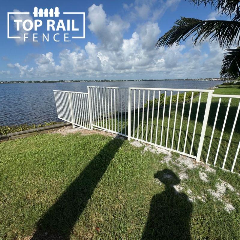 white aluminum fence installed by Top Rail Fence