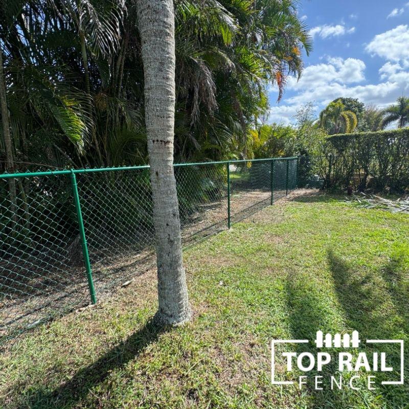 chain link fence installed by top rail fence