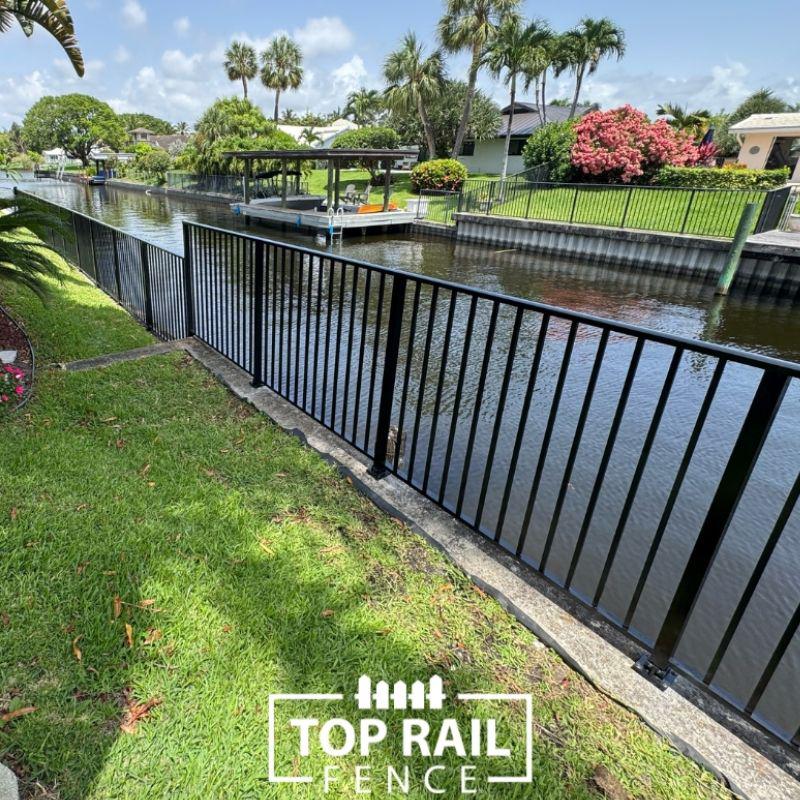Black Aluminum Seawall Fence Installation
