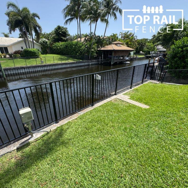 black aluminum fence installed by Top Rail Fence