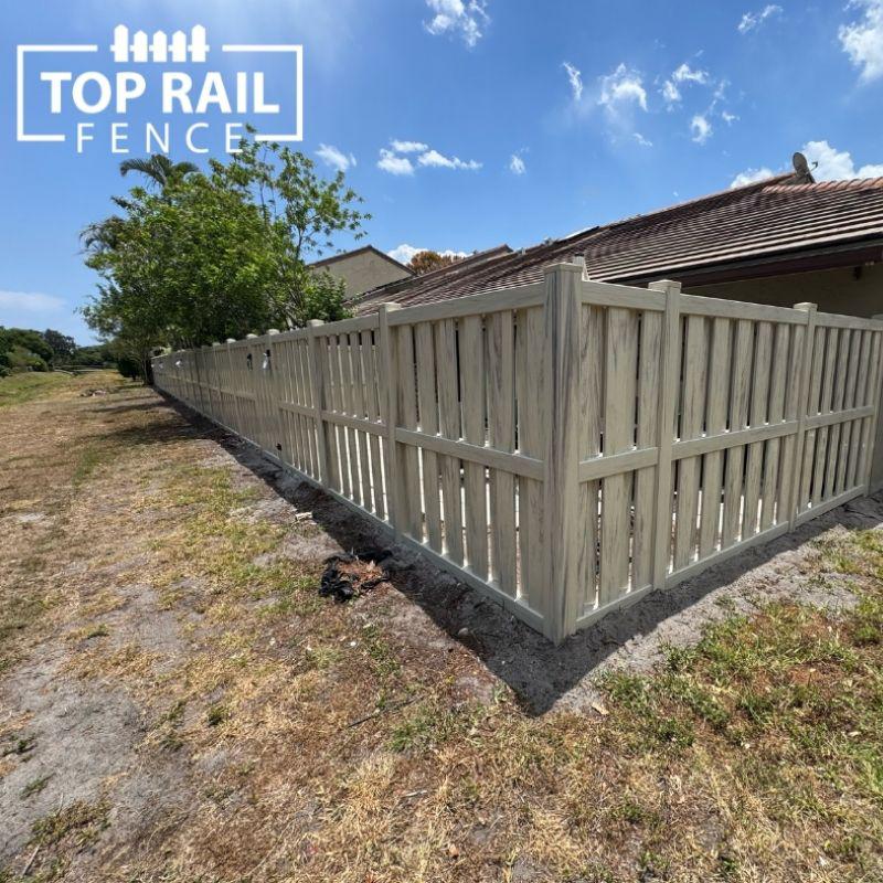 Woodgrain Tan Shadowbox Vinyl Fence Installation