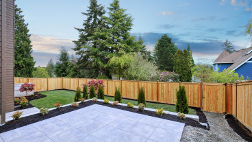 wood privacy fence around a backyard