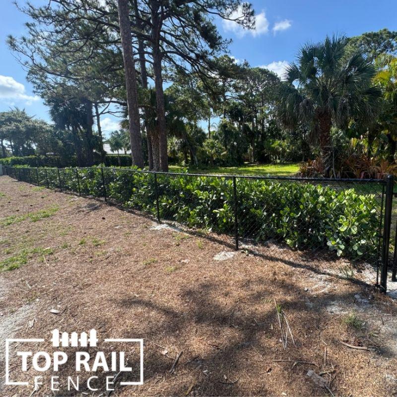 Chain link fence installation by Top Rail Fence