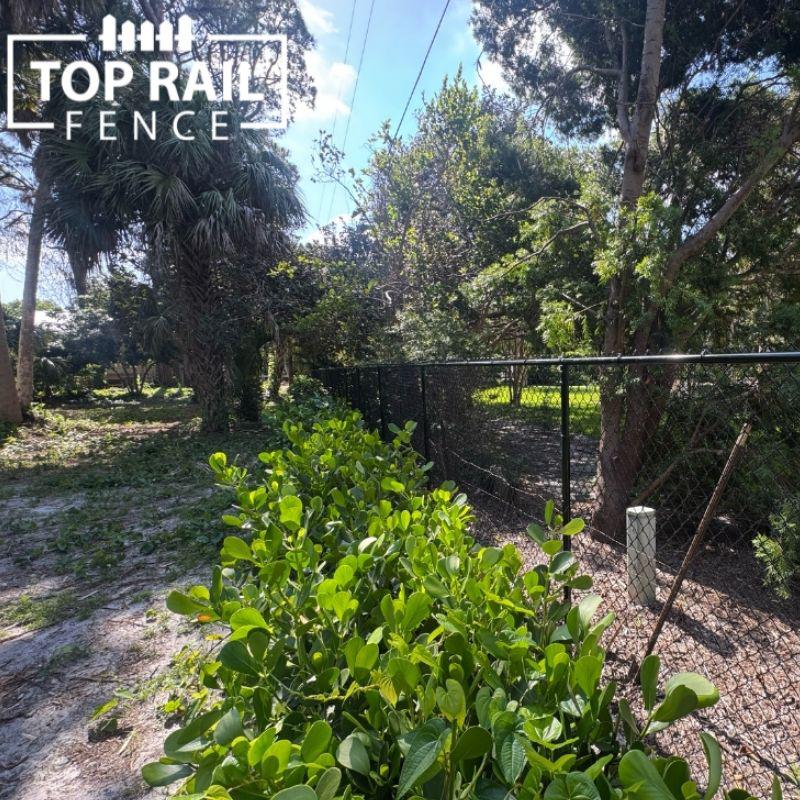 Chain link fence installation by Top Rail Fence