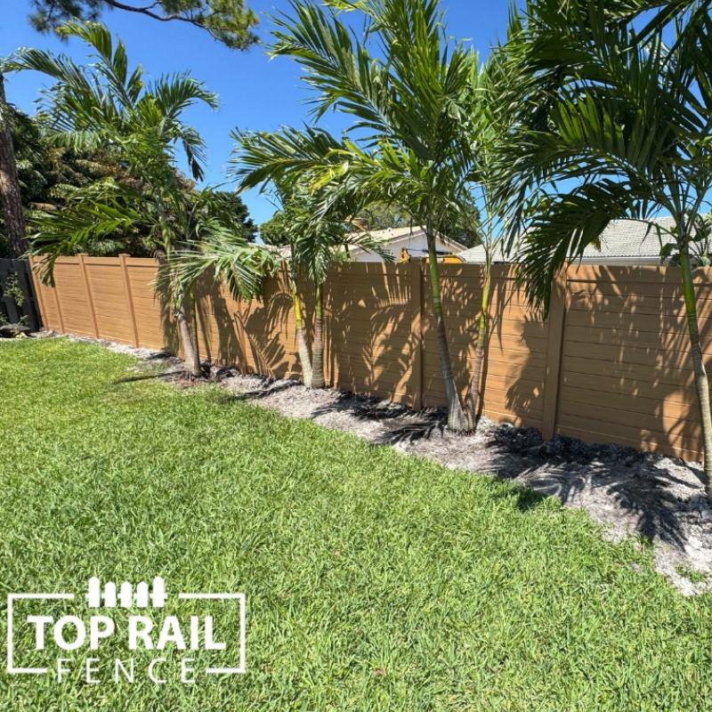 Horizontal Cypress Vinyl Fence Installation by Top Rail Fence