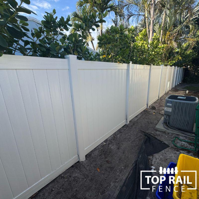 Vinyl fence installed by Top Rail Fence