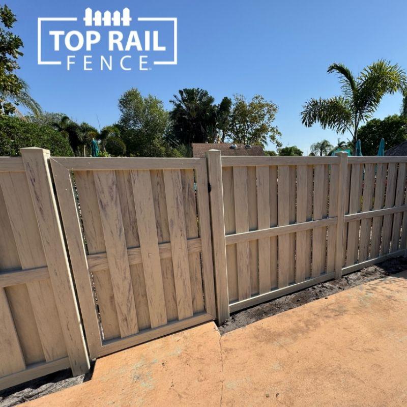 Woodgrain Tan Shadowbox Vinyl Fence Installation by Top Rail Fence