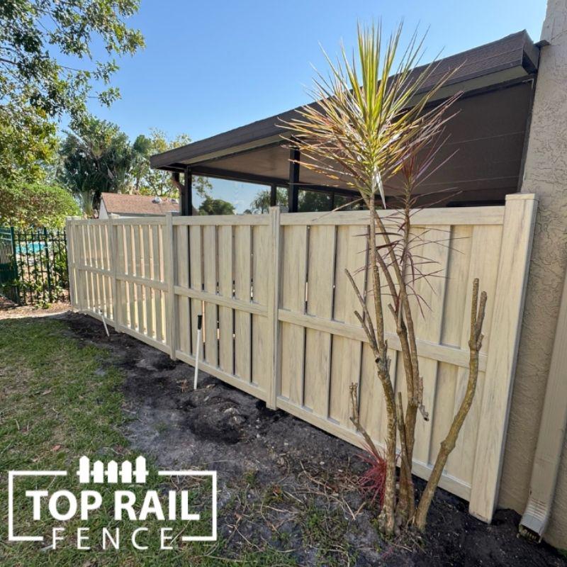 Woodgrain Tan Shadowbox Vinyl Fence Installation