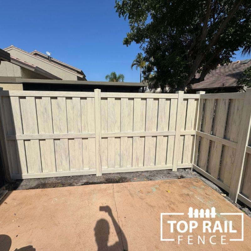Woodgrain Tan Shadowbox Vinyl Fence Installation by Top Rail Fence