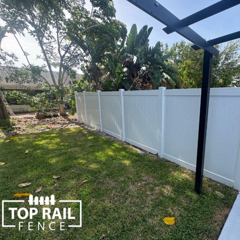 Vinyl Privacy Fence Installation by Top Rail Fence