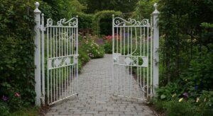 white wrought iron gate to garden