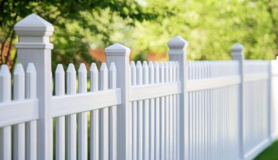 White vinyl picket fence