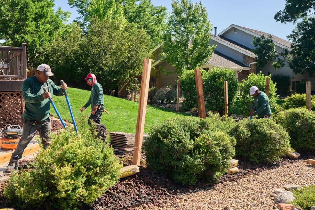 Top Rail Fence crew installing a fence