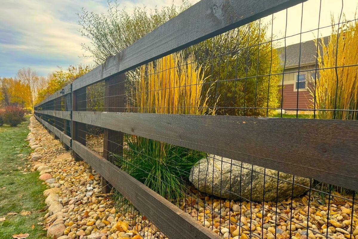 Wood hog wire fence