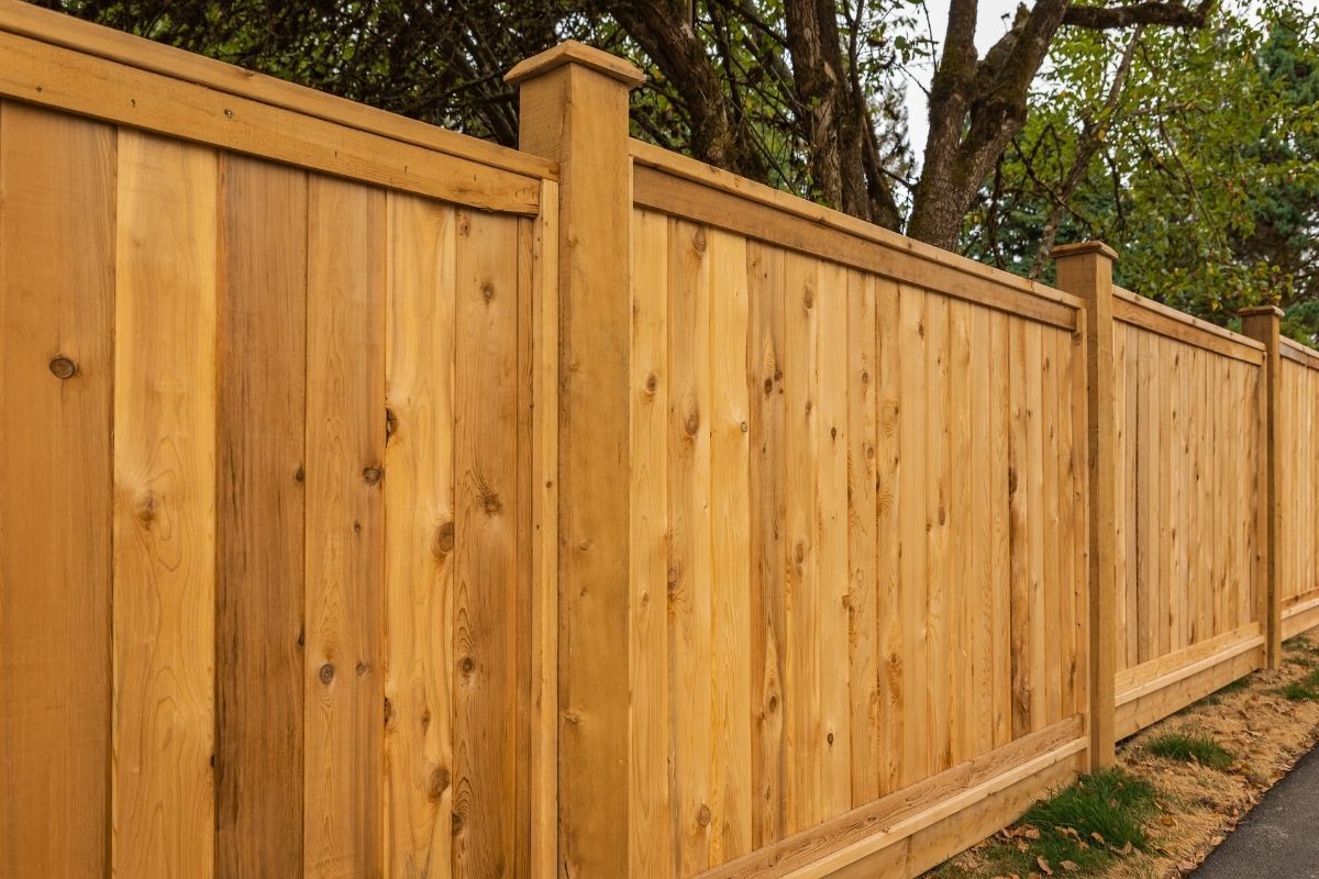 Newly installed wood cap and trim fence
