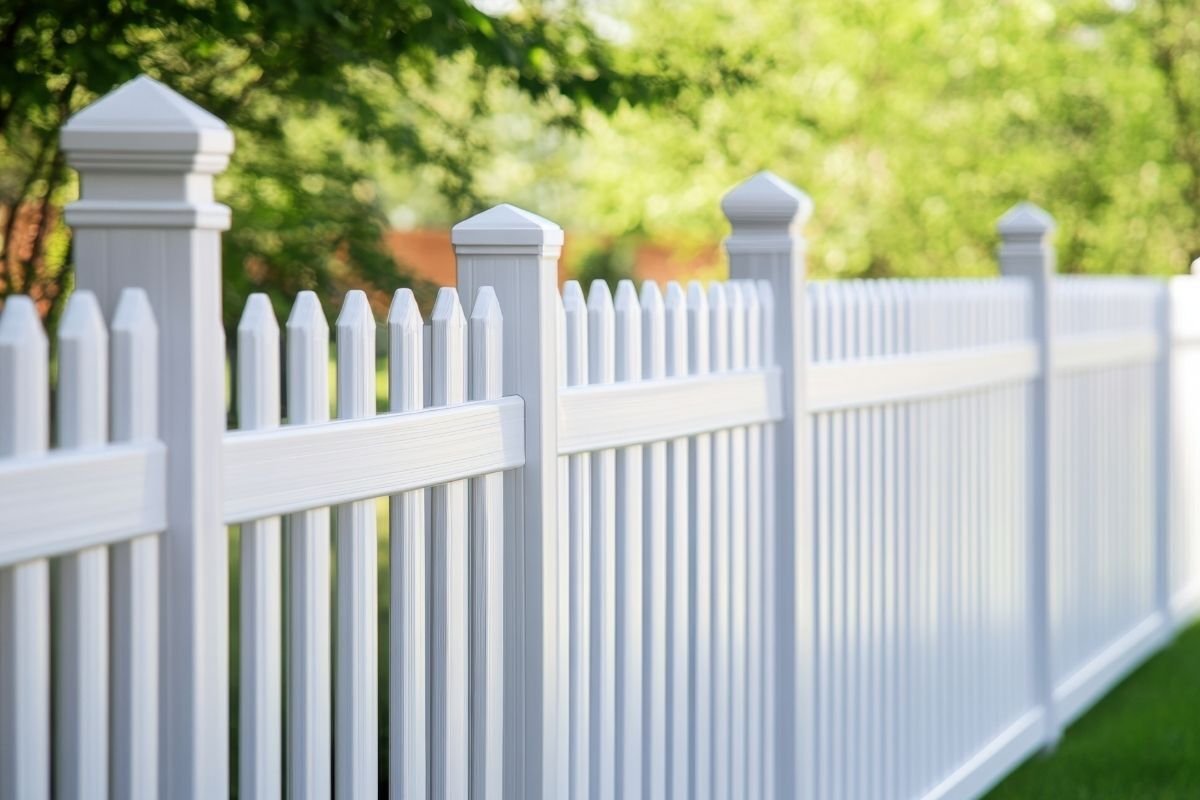 White vinyl picket fence