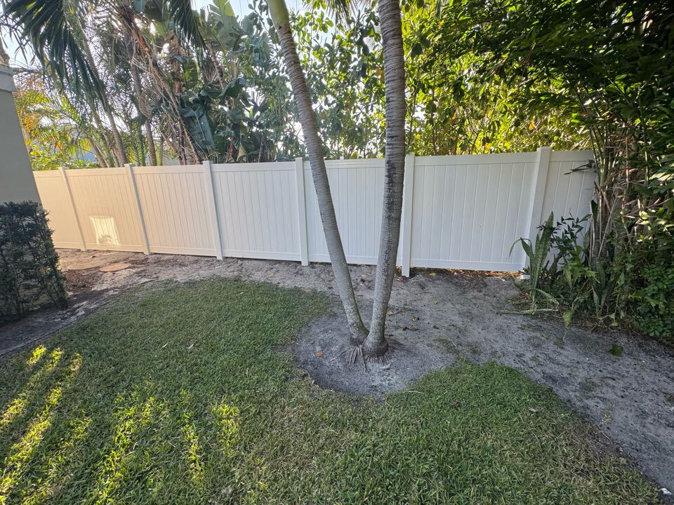 In West Palm Beach, FL, we removed 70 feet of old wood fencing and replaced it with a 6-foot-tall white privacy fence along the left side of a customer’s rental property. This upgrade provides a clean, modern look while enhancing privacy and durability. 