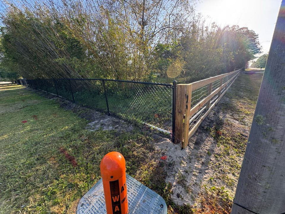 In Palm Beach Country Estates, Palm Beach Gardens, FL, we removed 440 feet of old fencing and replaced it with 255 feet of 4-foot-tall black chain link along the side of the home, and 196 feet of 3-rail post and wire fence across the front. We knocked the project out in just two days and handled the permitting to keep things easy for the customer.