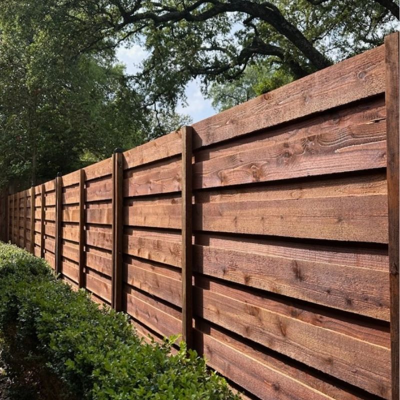 dark stained Horizontal wood fence
