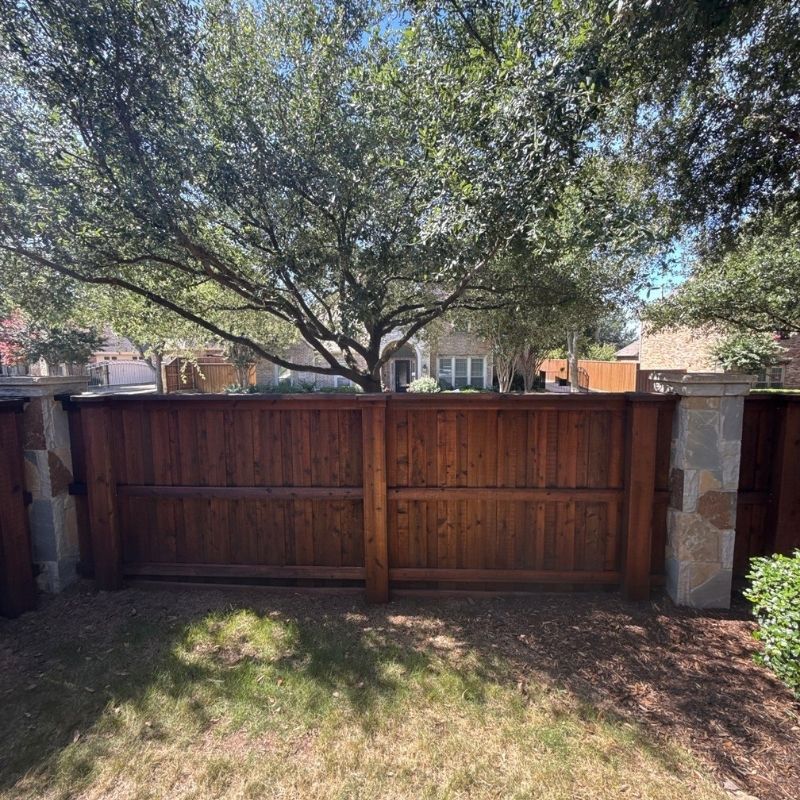 Wood fence restoration by Top Rail Fence