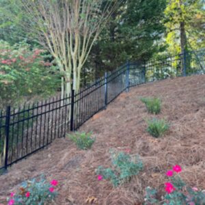 new aluminum fence with landscaping