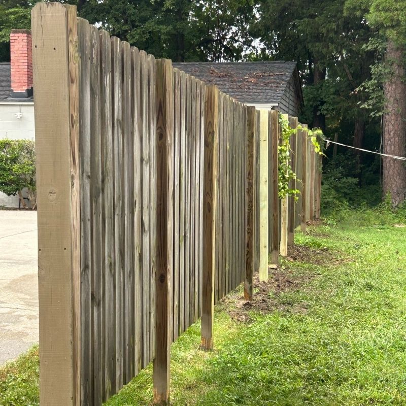 stockade fence repair by top rail fence