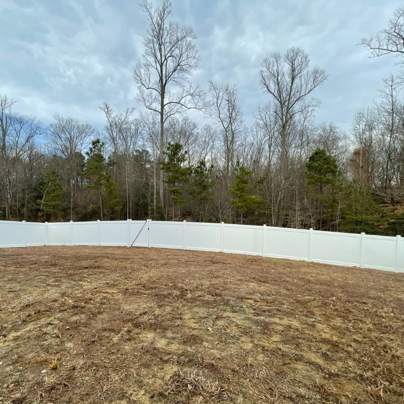 new vinyl fence installation by Top Rail Fence