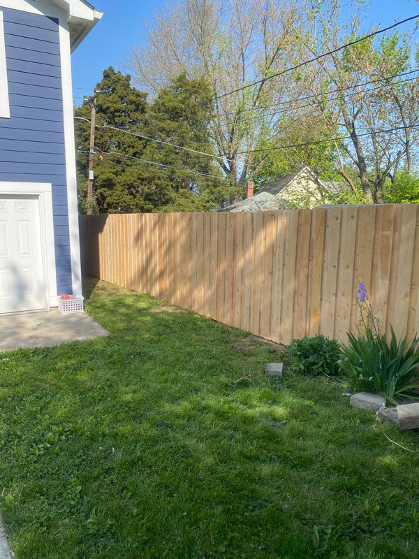 Board on Board wood fence installation in North Indianapolis