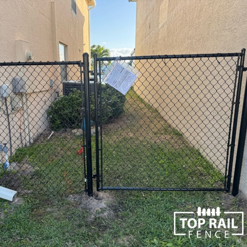 new chain link fence gate installed by Top Rail Fence