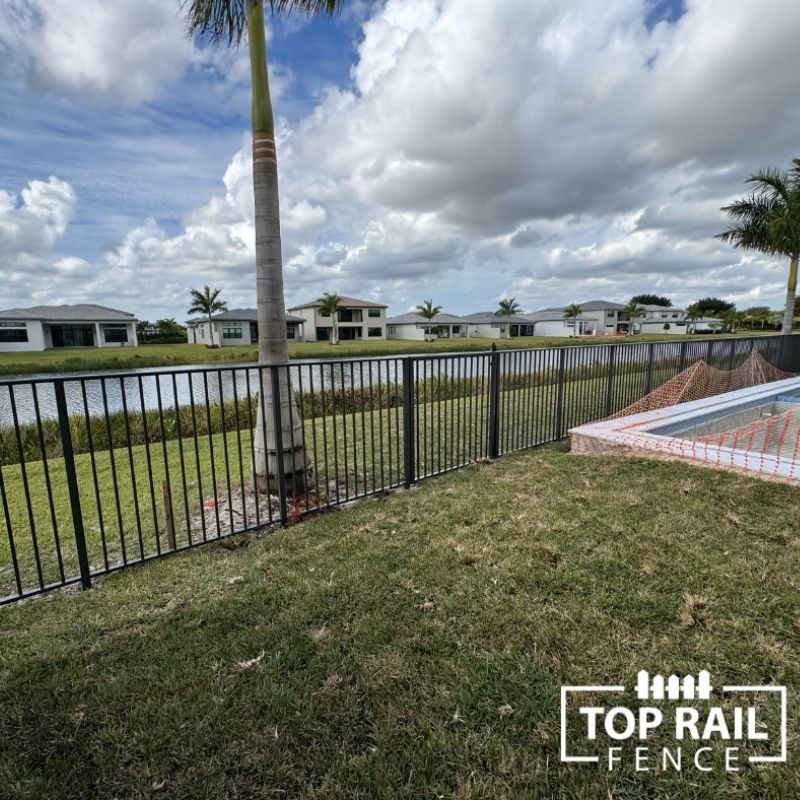 New aluminum pool fence installed by Top Rail Fence