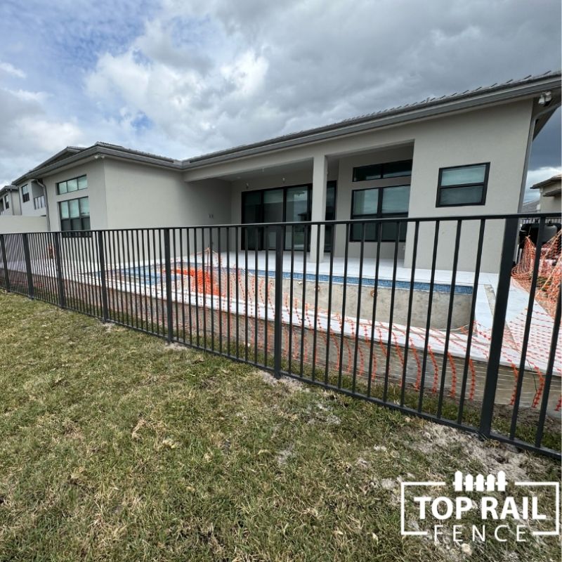 New aluminum pool fence installed by Top Rail Fence