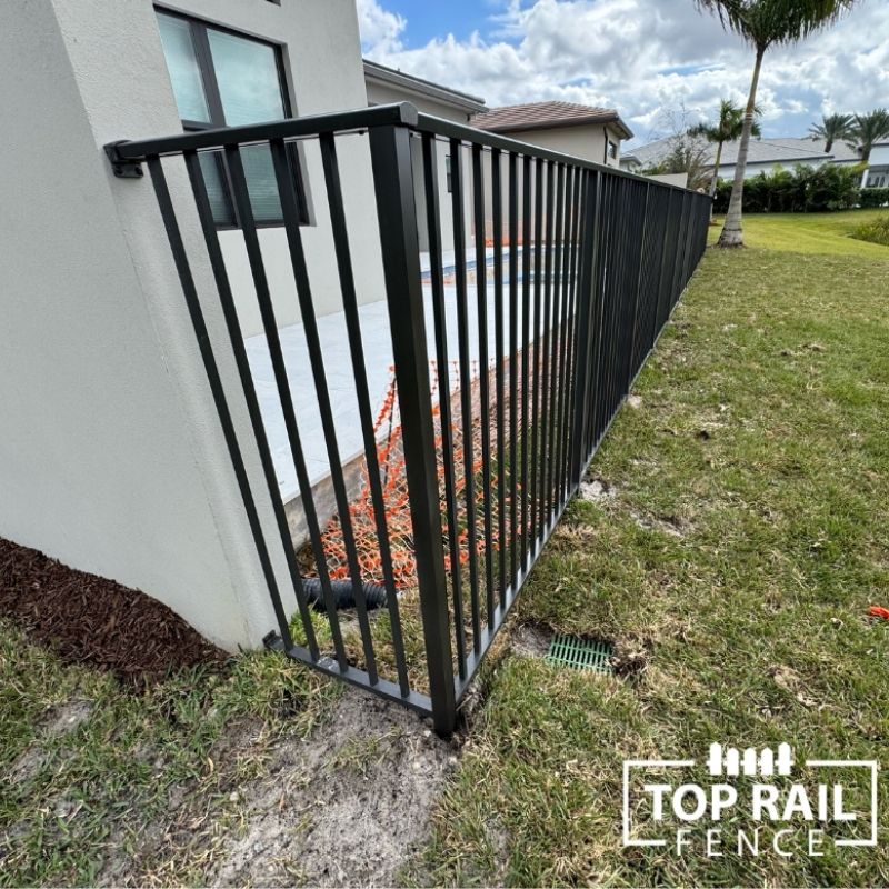 New aluminum pool fence installed by Top Rail Fence