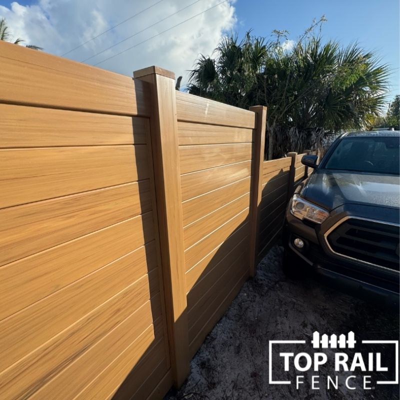 Vinyl cypress color pirvacy fence installed by Top Rail Fence