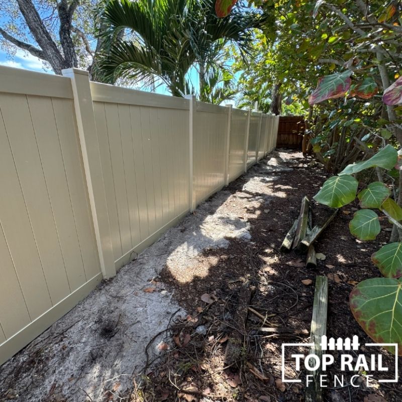 white vinyl fence installed by Top Rail Fence