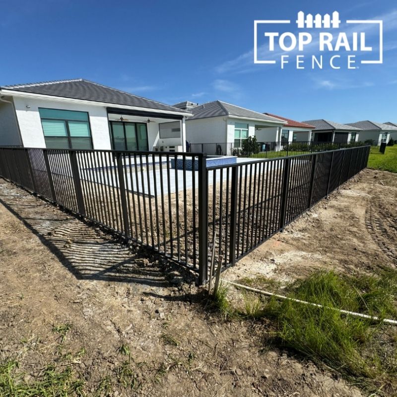 aluminum fence installed by top rail fence