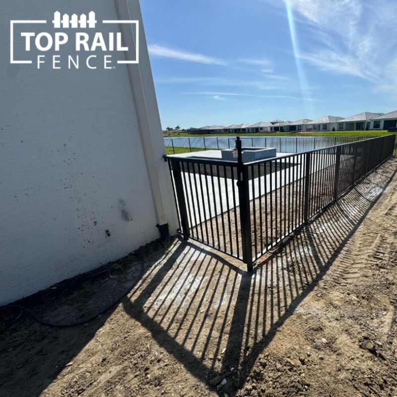 aluminum fence installed by top rail fence