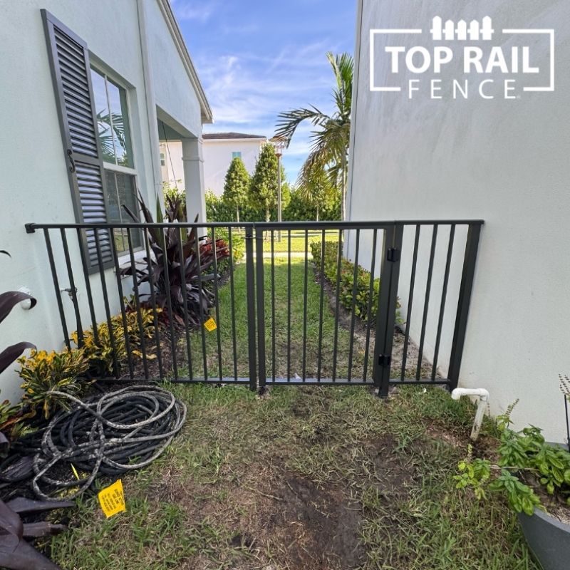aluminum fence installed by top rail fence