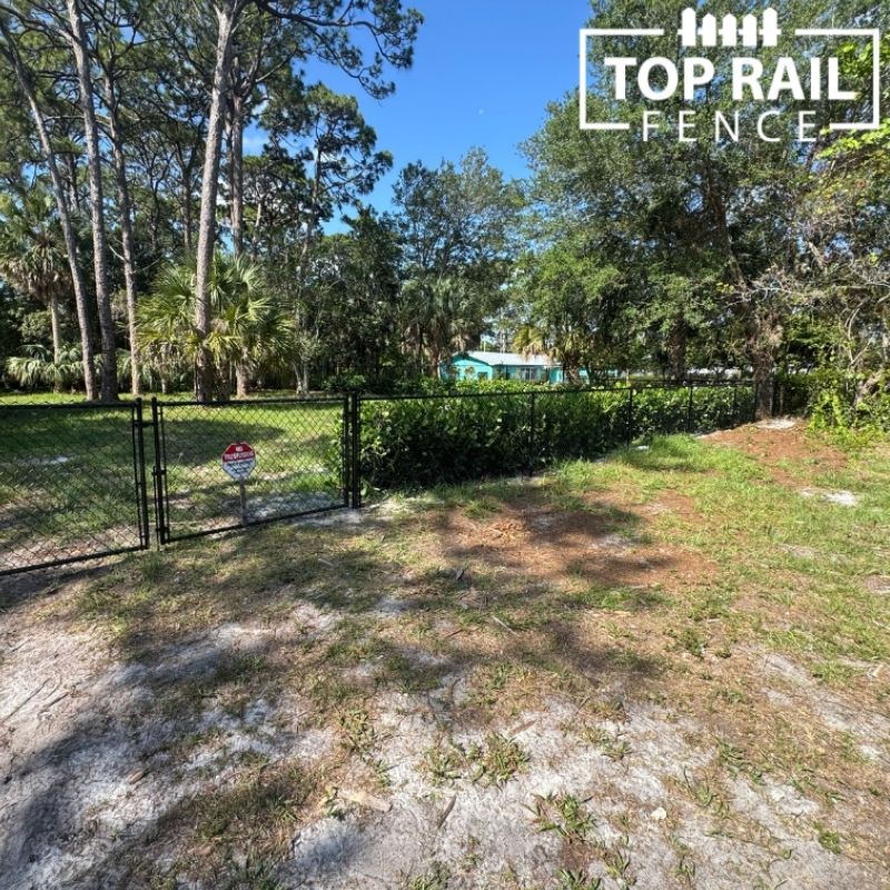 Chain link fence installation by Top Rail Fence