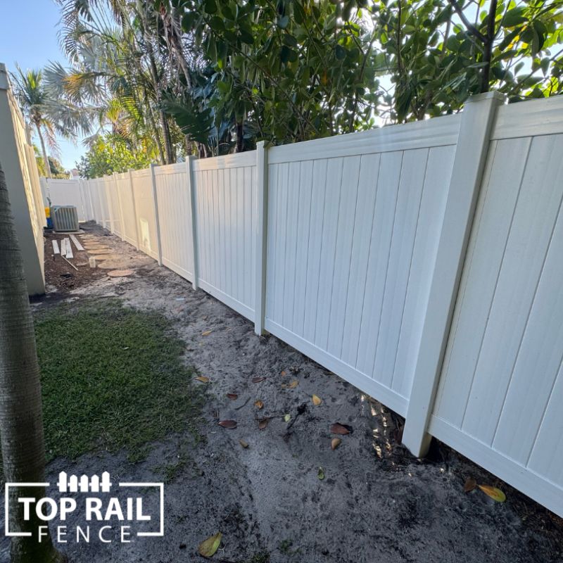 Vinyl fence installed by Top Rail Fence