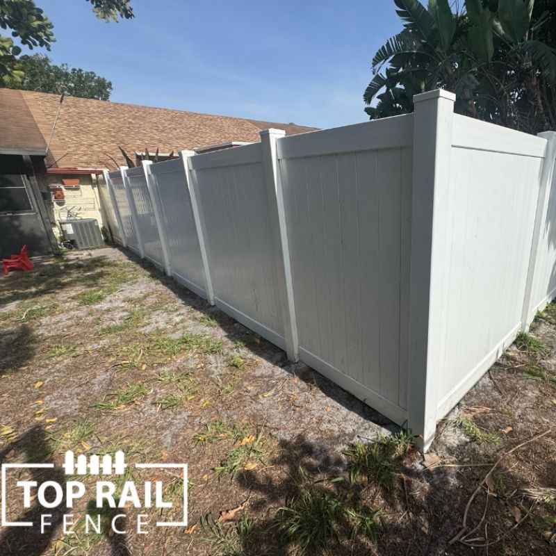 Vinyl Privacy Fence Installation by Top Rail Fence