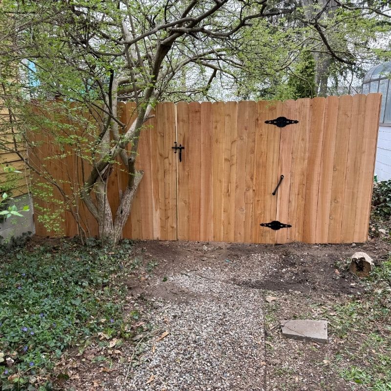 cedar stockade fence installed by top rail fence