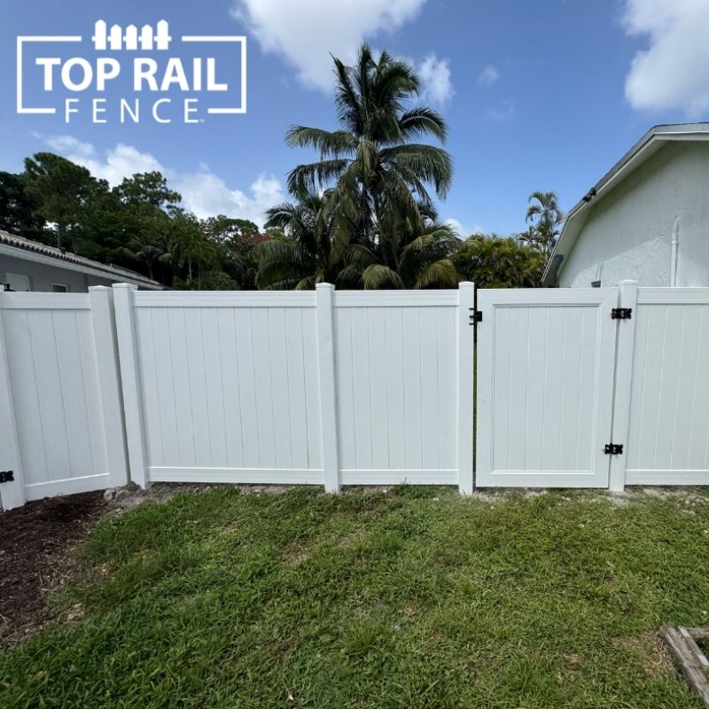 vinyl fence installed by top rail fence