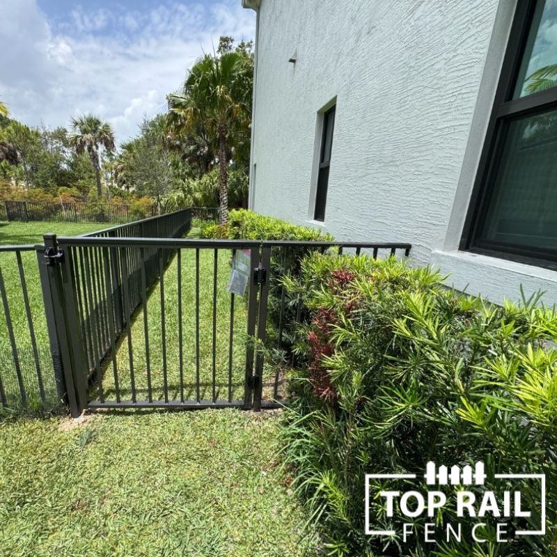 aluminum fence installed by top rail fence