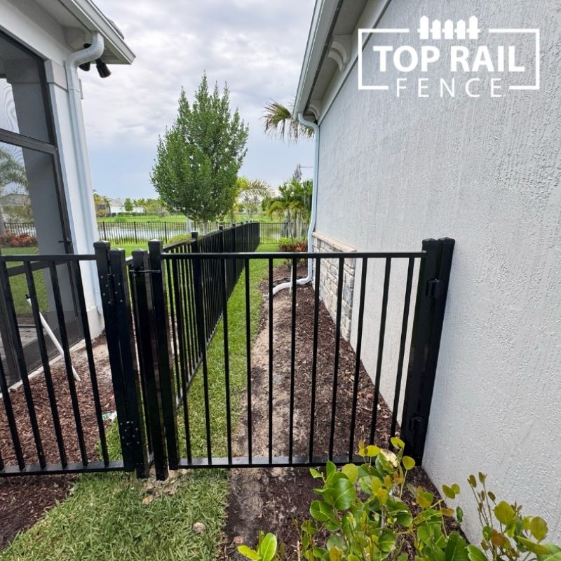 aluminum fence installed by top rail fence