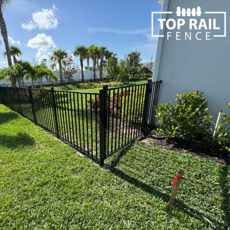 aluminum fence installed by top rail fence